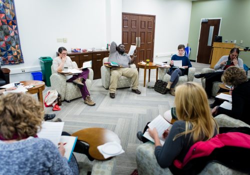 A group of professors meeting in an Inquiry ARC reading circle.